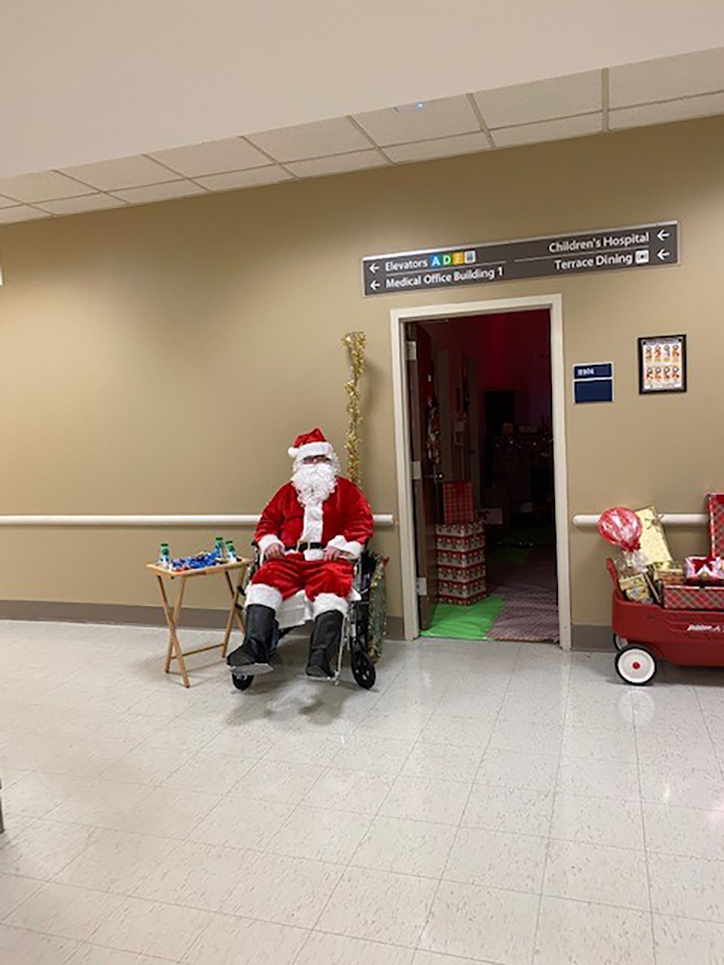 Santa sitting in hallway